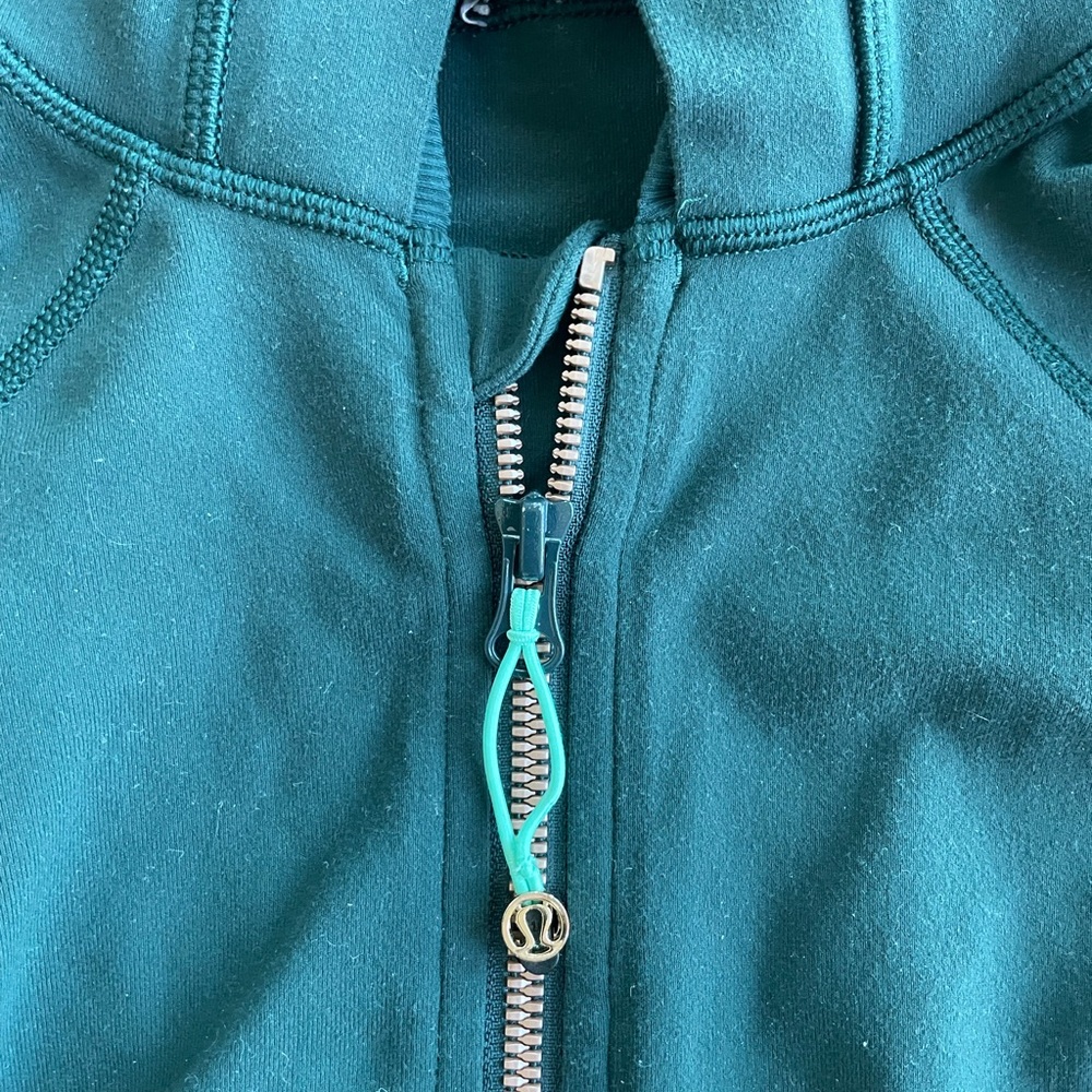Dark green Lululemon workout zippy